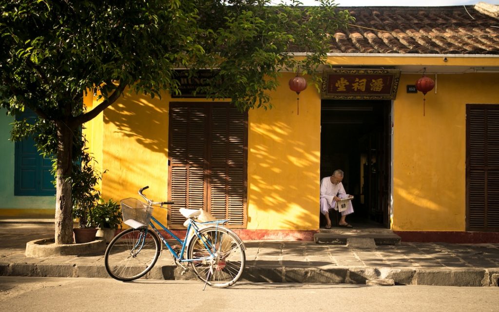 Yellow house with a bike in Cambocha
